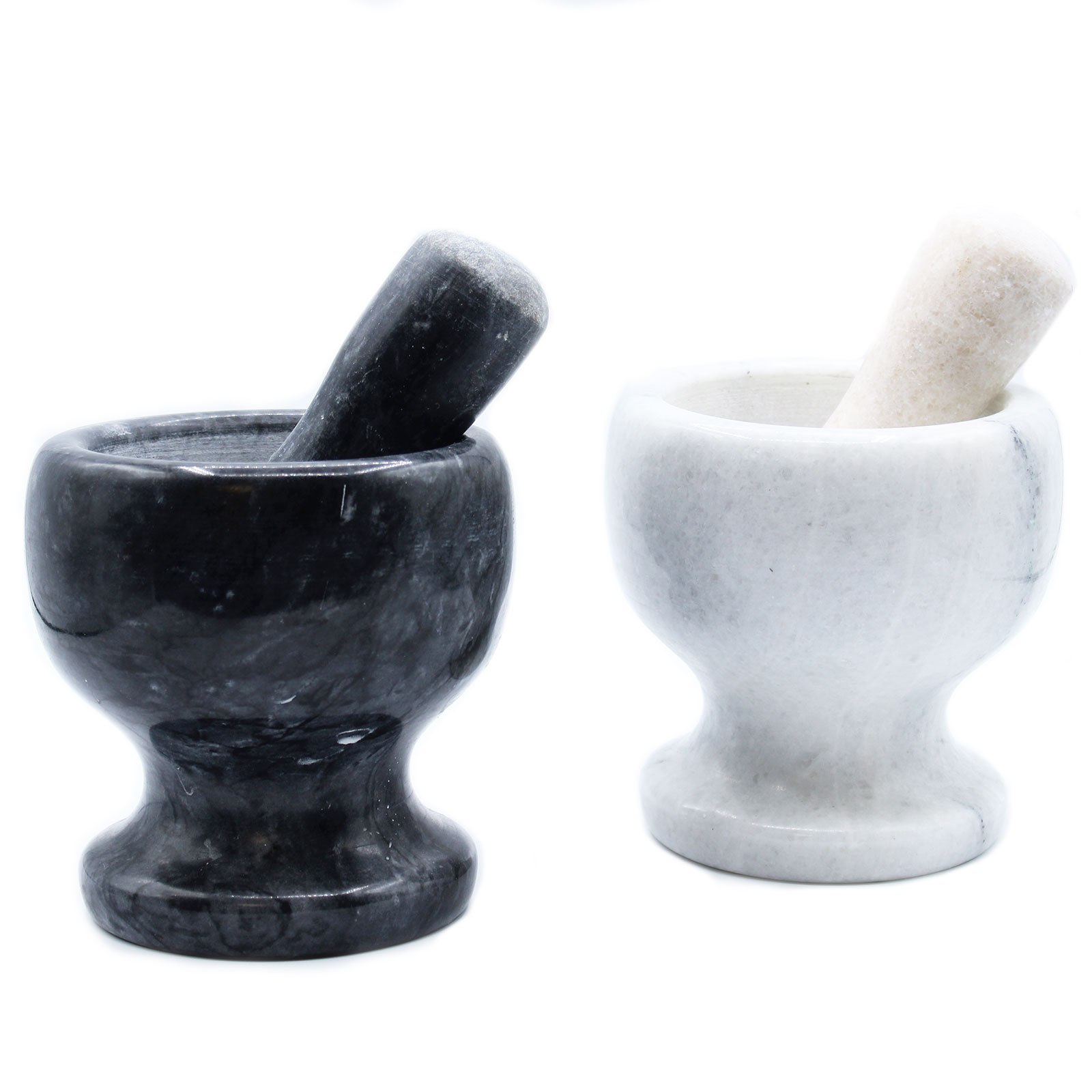 two marble pestle and mortar sets
